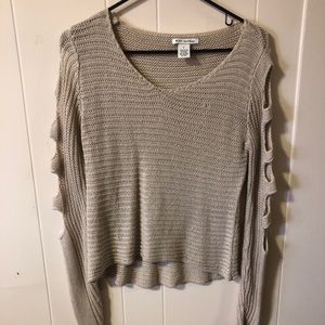 Sweater with ripped sleeves